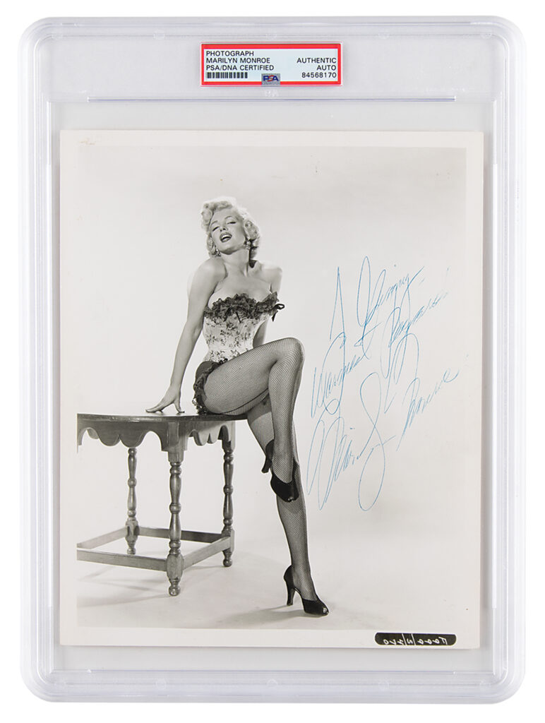 A signed still of Marilyn Monroe for the movie River of No Return. This PSA encapsulated photo sold for $20,660.