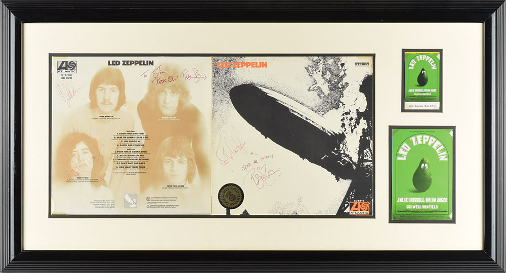Led Zeppelin's self-titled debut album framed alongside a postcard and ticket stub for Led Zeppelin at the Fillmore in April 1969.