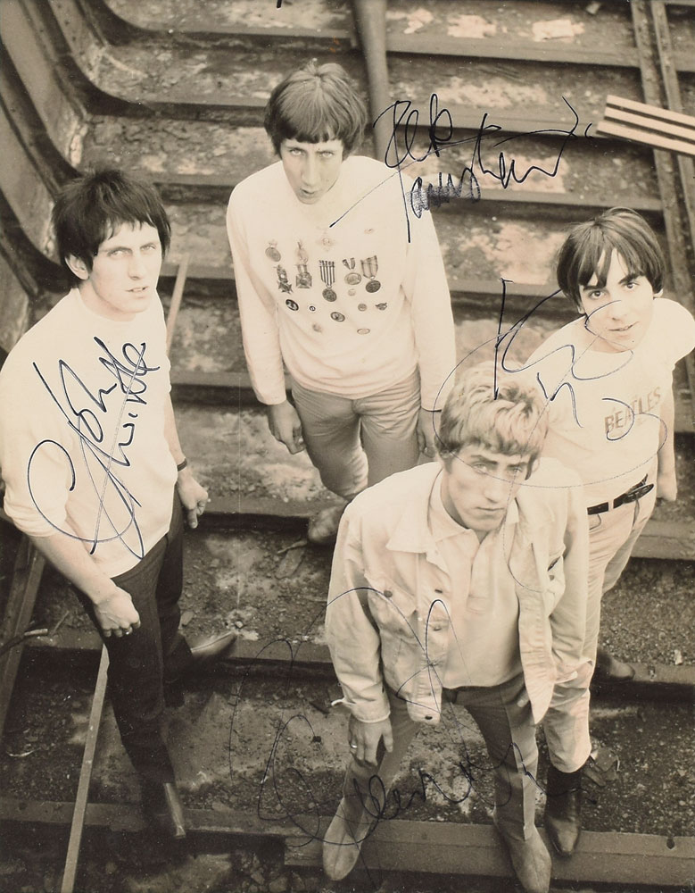 A full signed photograph of The Who early on in their careers.