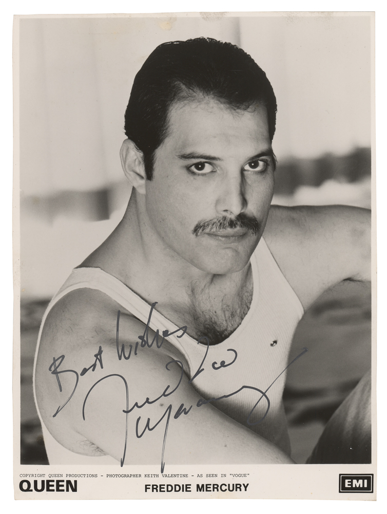 This photograph of Mercury in his iconic white tank top most known from Queen's Live Aid performance sold for $5,913.