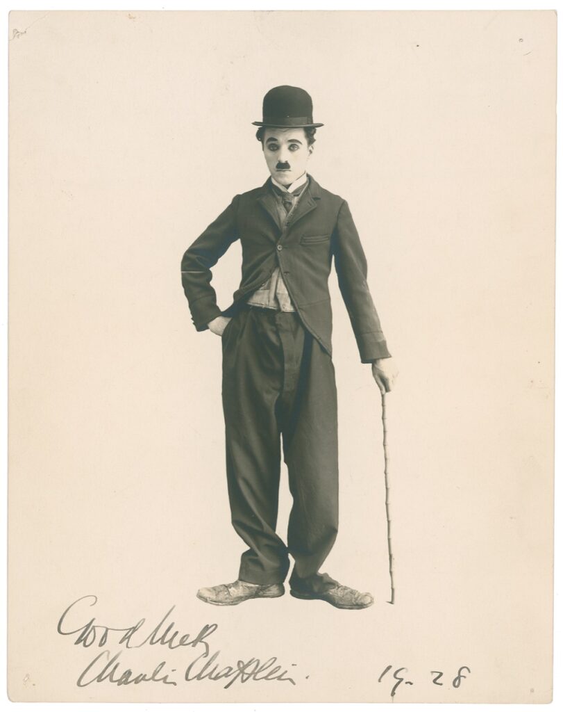 A photo of Chaplin dressed as the delightful Tramp character complete with the trademark hat, cane, and mustache. This portrait sold for $7,851.