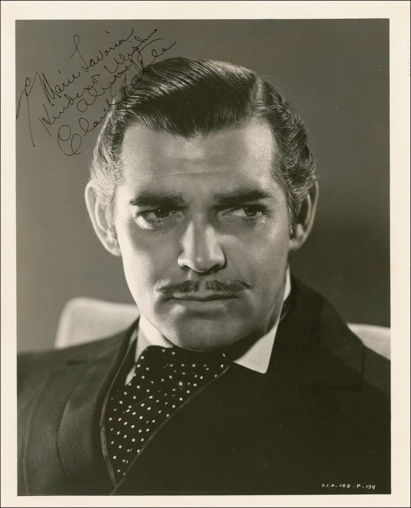 An inscribed photo of Gable as the smartly dressed Rhett Butler in 1939's Gone with the Wind.