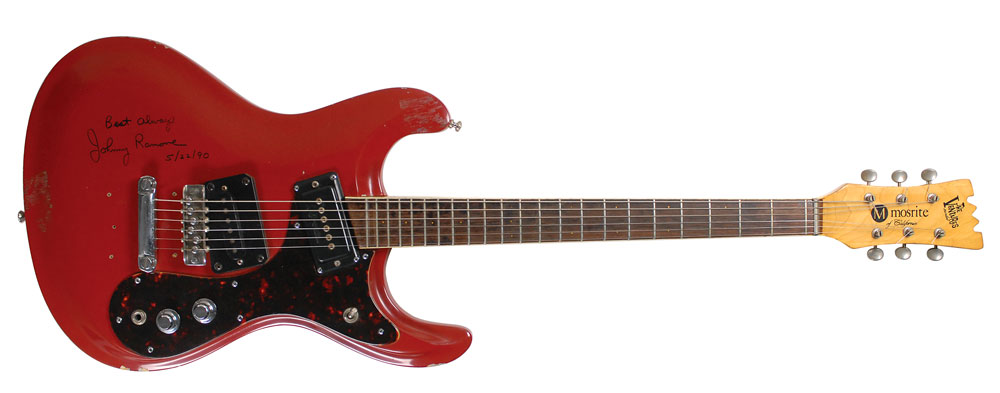 Johnny Ramone's red Mosrite Ventures I with his signature written in black felt tip.