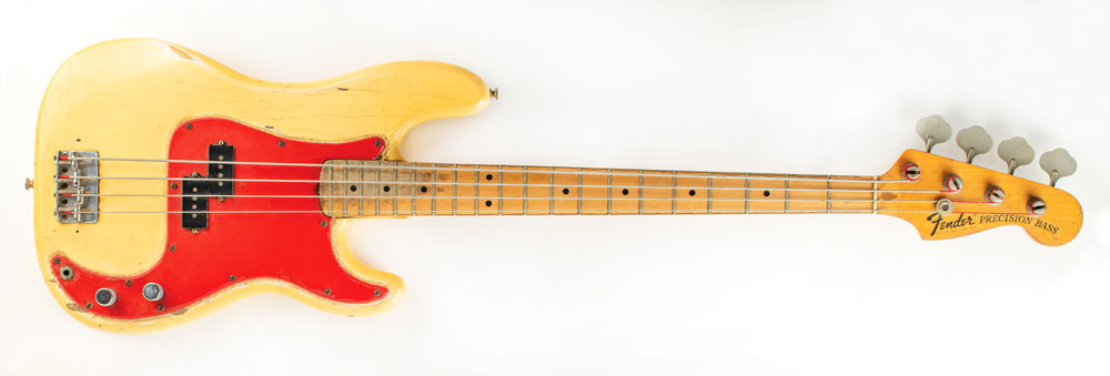 Dee Dee Ramone's Fender Precision Bass featuring a cream body and eye-popping red pickguard.