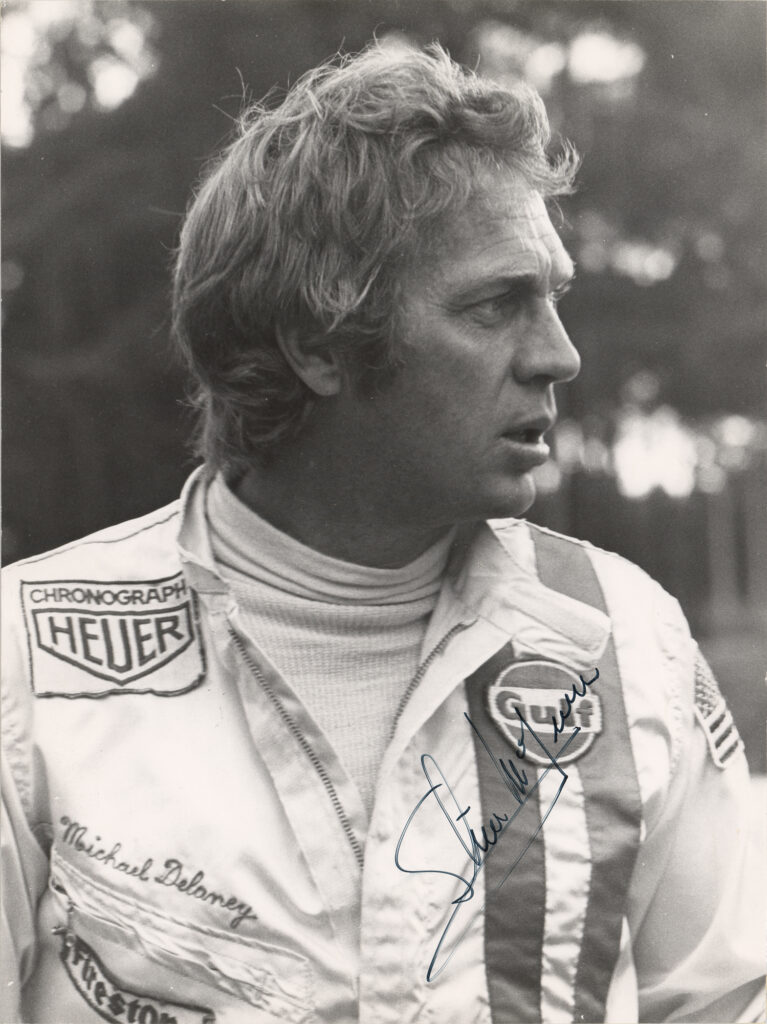 Signed photograph of McQueen as race car driver Michael Delaney in the 1971 film Le Mans.
