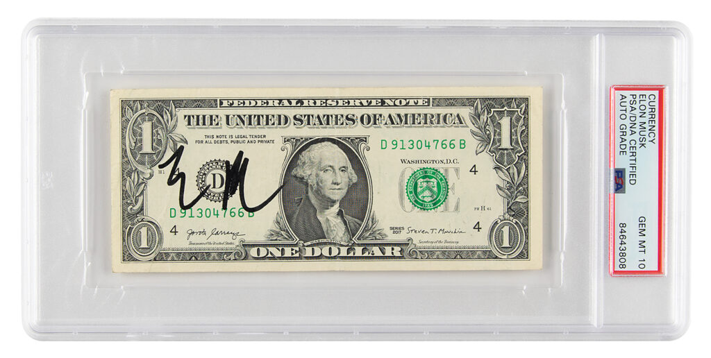 Elon Musk signed dollar bill encapsulated in a PSA/DNA authentication holder.