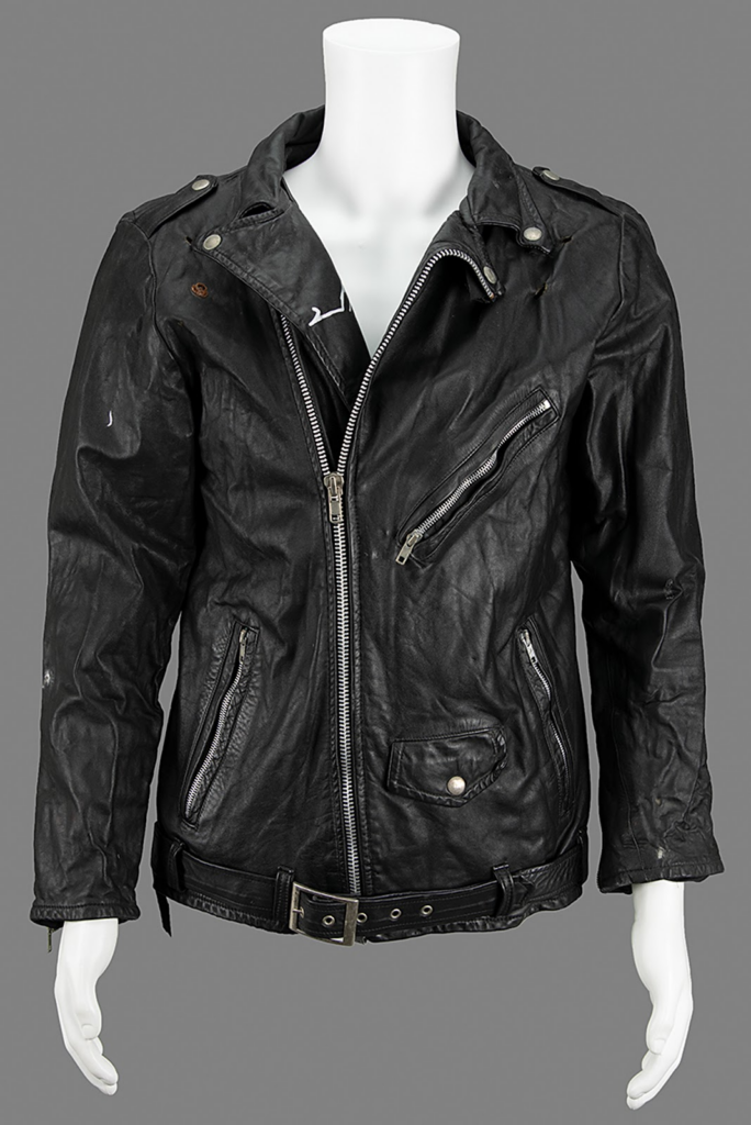 This leather jacket was custom-made for lead vocalist Joey Ramone by a fan. He wore this jacket for the band’s European tour in early 1994, but a torrential downpour damaged the leather. He was forced to retire the jacket but kept it as he was sentimental towards fan-made gifts. 