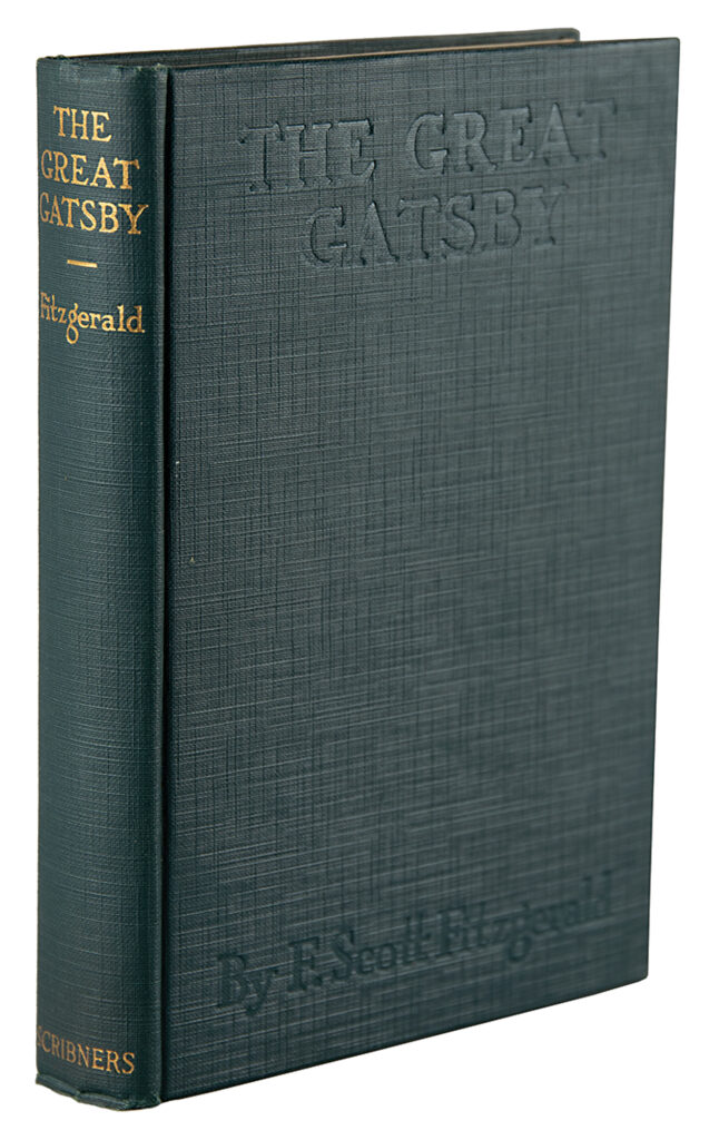 Green cloth-bound first edition copy of The Great Gatsby featuring a gold gilt-lettered spine that reads, "The Great Gatsby, Fitzgerald."