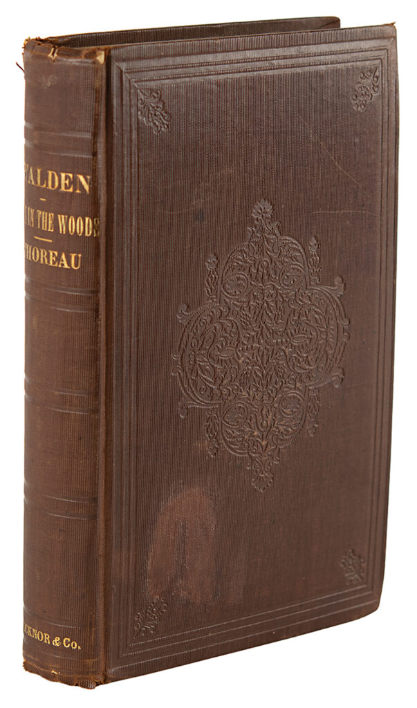 Scarce first edition copy of Walden, featuring its brown leather cover and gilt-lettered spine reading, “Walden; or, Life in the Woods, Thoreau.”