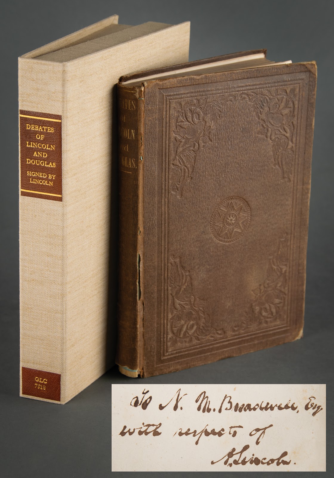 First edition printing of the Lincoln-Douglas Debates published in 1860 pictured with its custom clamshell case and a photo of Lincoln’s signature.