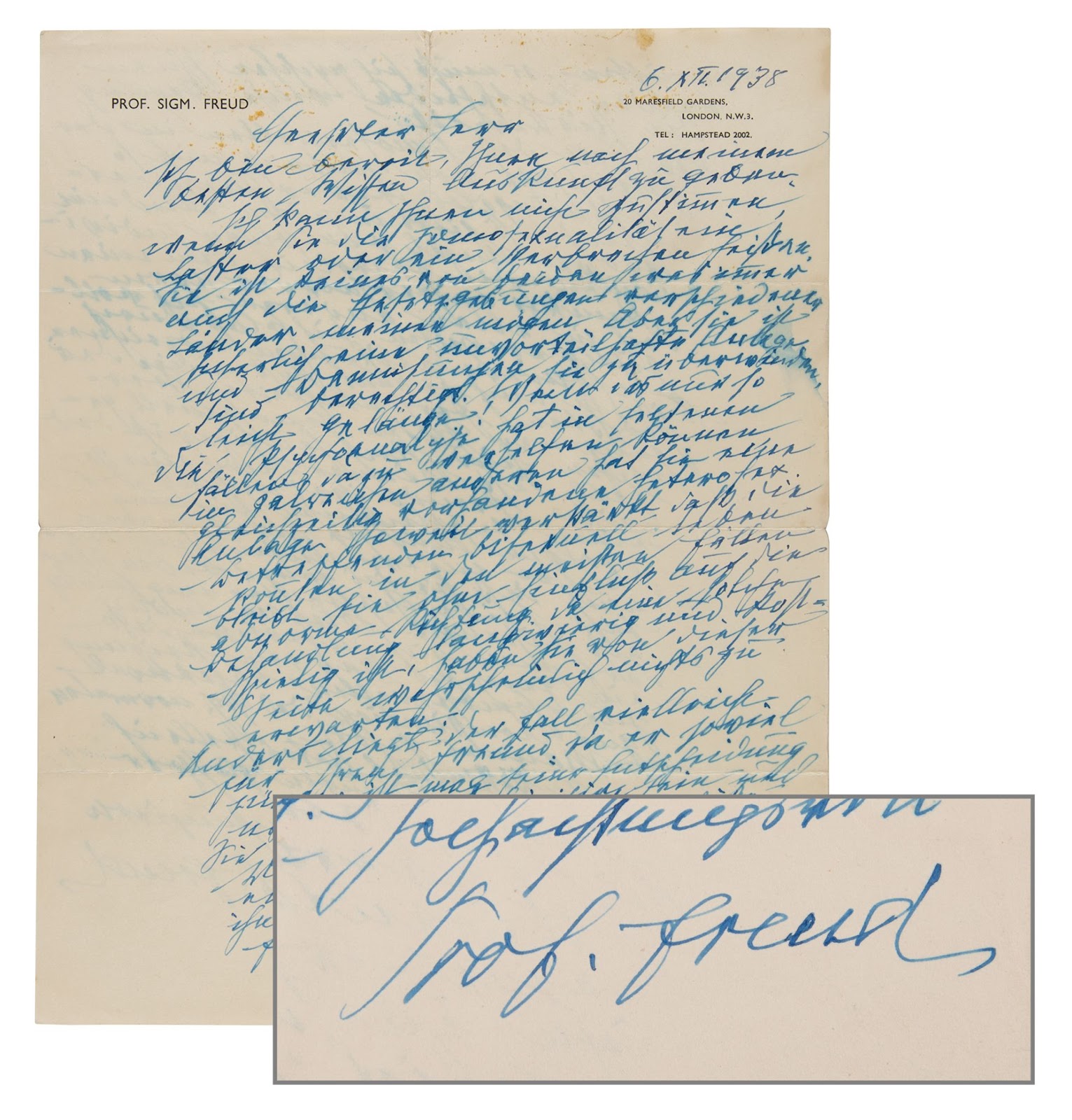 Freud’s letter written in blue ink and his sweeping signature reading, “Prof. Freud.”