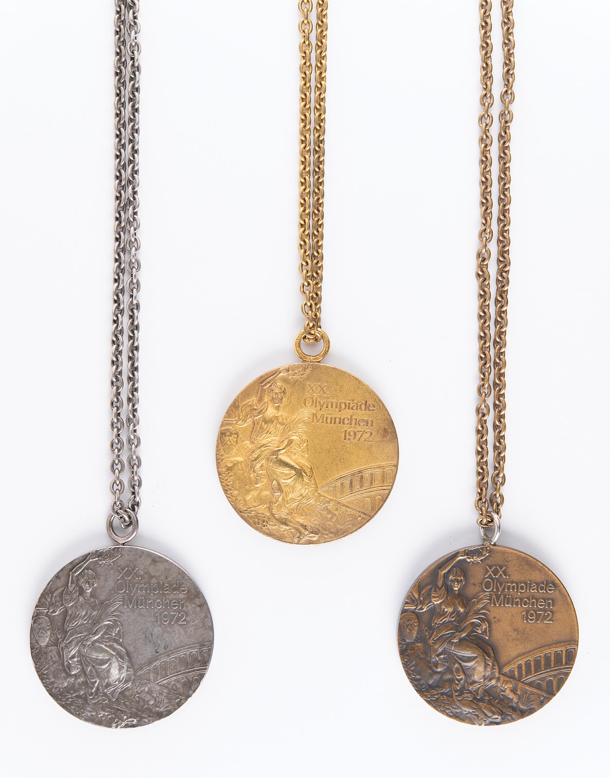 Genter’s trinity of gold, silver, and bronze medals earned during the Munich 1972 Olympics Games, his first and final Olympiad.