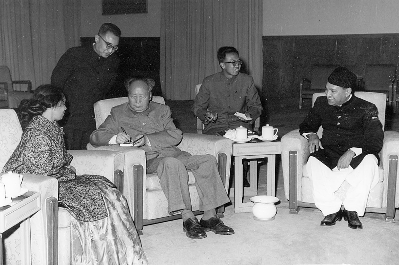 Photograph of Chairman Mao signing the Little Red Book for Foreign Minister Pirzada’s wife.