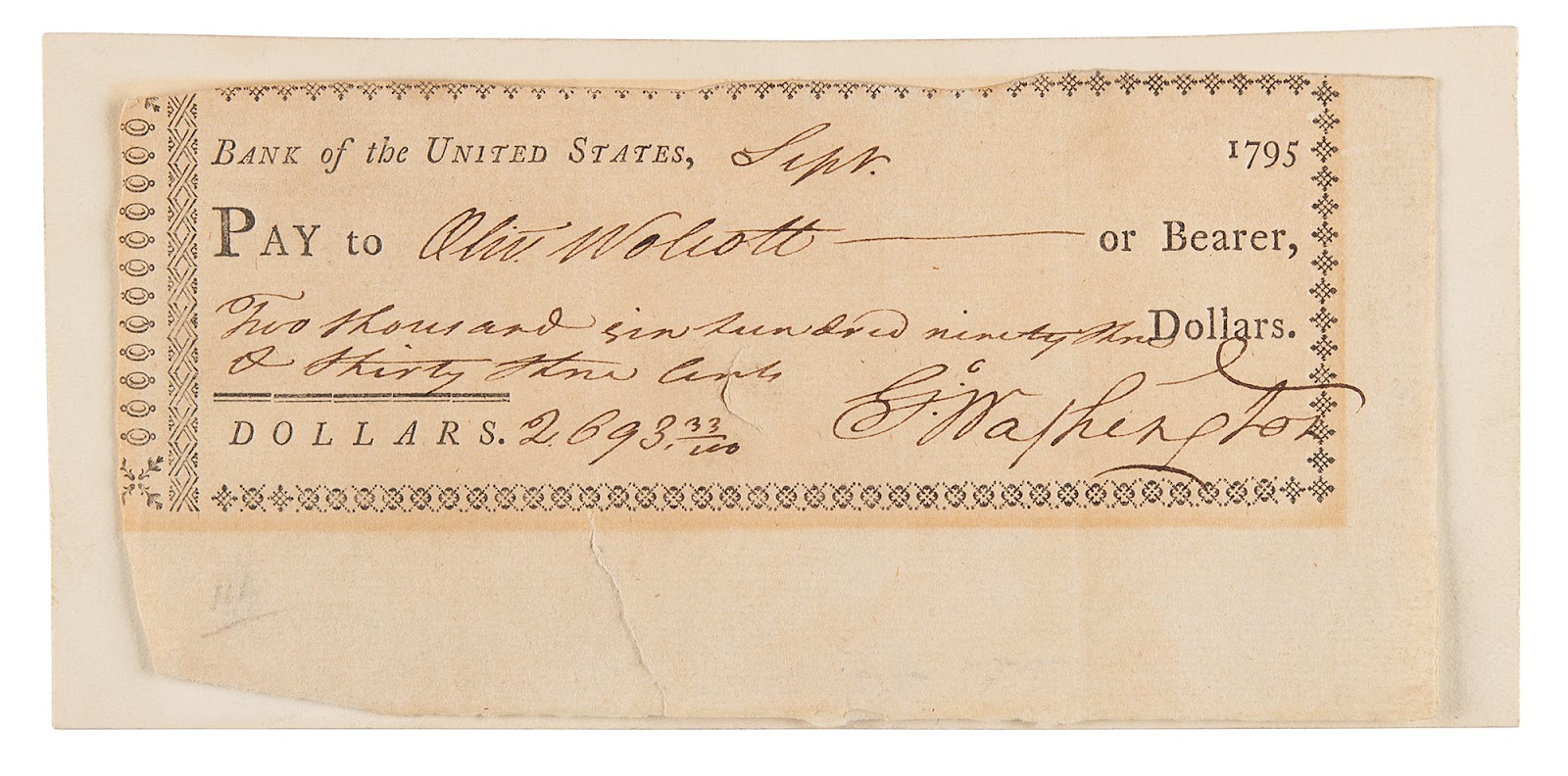 George Washington signed check made payable to Oliver Wolcott, Jr. for a sum of $2693.33.