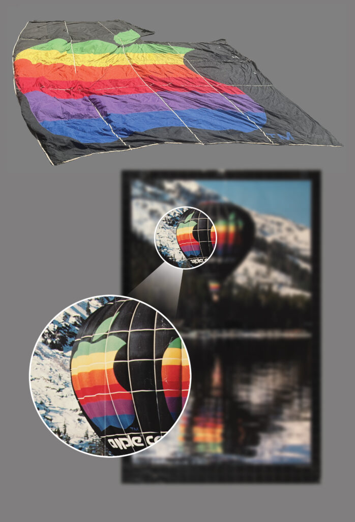 Large piece of hot air balloon showing the original color Apple Computer logo cut from the balloon pictured in the famous Apple Donner Lake poster.