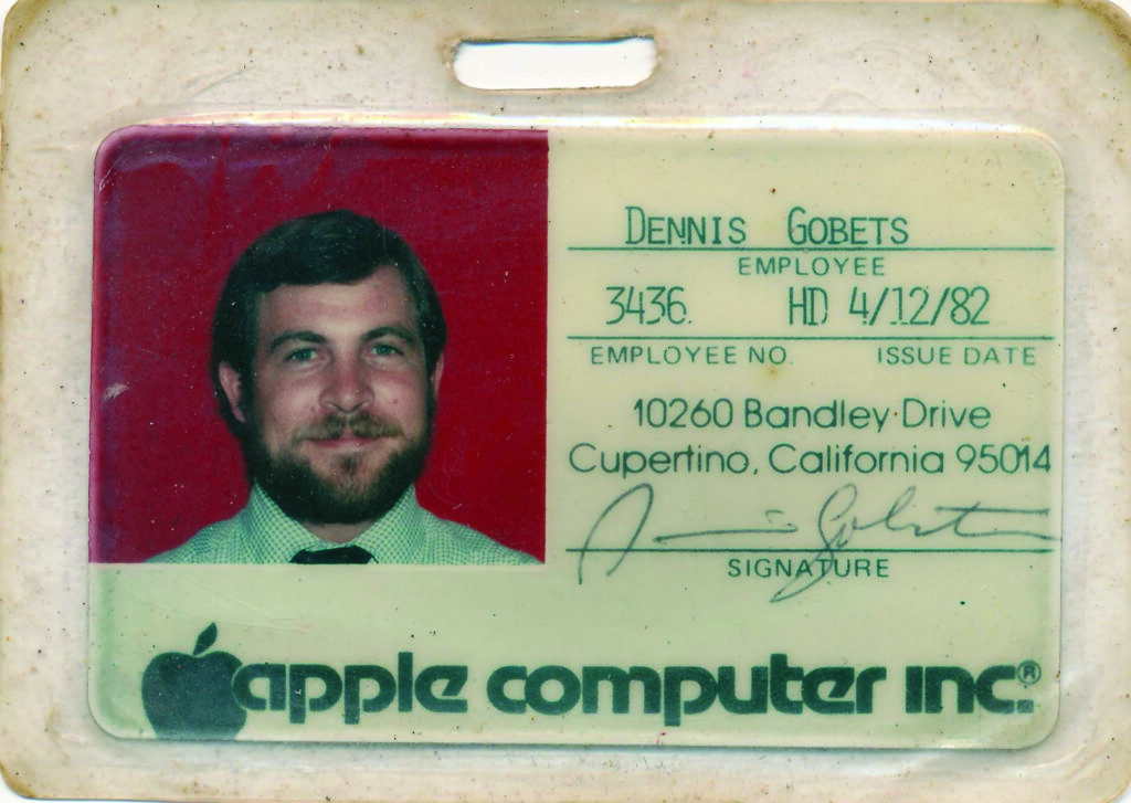 Dennis Gobets Apple Computer ID, featuring his portrait, name, employee number, issue date, Apple's address, and signature.