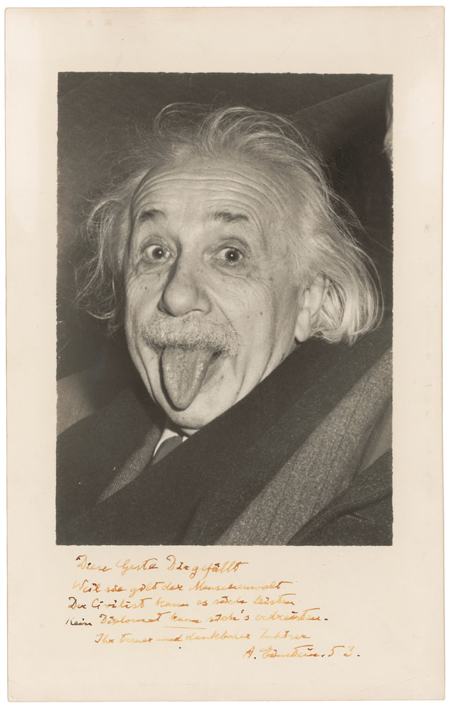 Amazing and extremely rare matte-finish 7 x 11 world-famous photo of Albert Einstein sticking out his tongue, signed in the lower border in fountain pen in German rhyme, “Diese Geste Dir gefällt, Weil sie gelt der Menschenwelt, Der Civilist kann sich’s leisten, Kein Diplomat kann sich’s erdreisten. Ihr Freund und dankbarer Zuhörer,” translated to “This gesture you will like, Because it is aimed at all of humanity. A civilian can afford to do what no diplomat would dare. Your loyal and grateful listener, A. Einstein 53.”