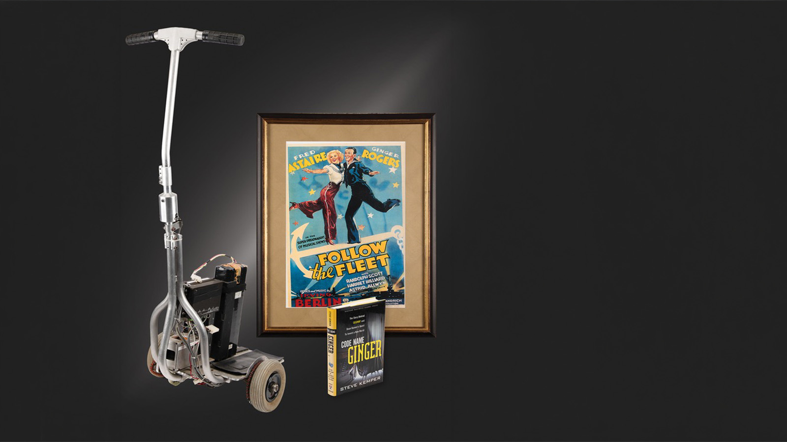 Early Segway “Ginger” prototype with Follow the Fleet poster and Code Name Ginger book