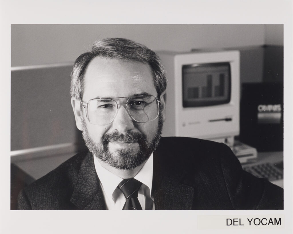 Del Yocam at his desk during his years at Apple