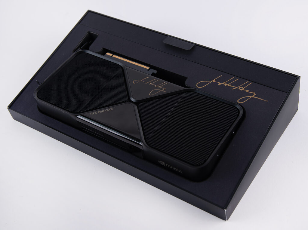NVIDIA RTX Pro 6000 Blackwell Workstation Edition graphics card signed in gold ink by Jensen Huang.