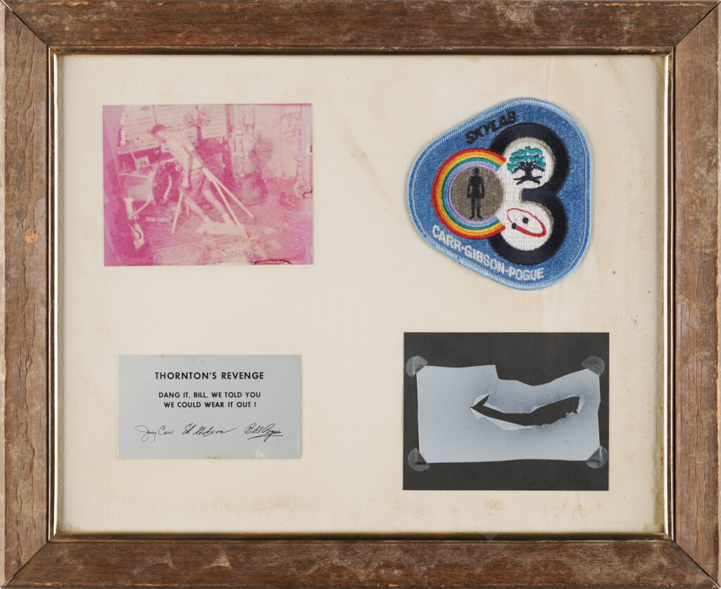 Skylab 4 crew presentation with a swatch of Teflon from the Thornton treadmill, engraved Thornton's Revenge